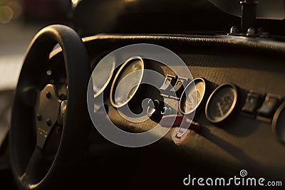 Detail of a Super Sport Car Cockpit â€“ Dashboard with speedometer and gauges in backlight Stock Photo